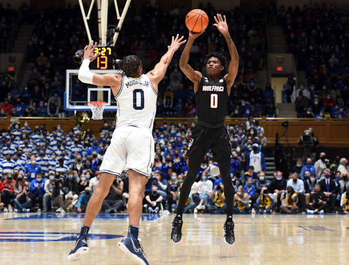 Terquavion Smith shoots over Wendell Moore Jr. on January 15, 2022 in Cameron Indoor Stadium.